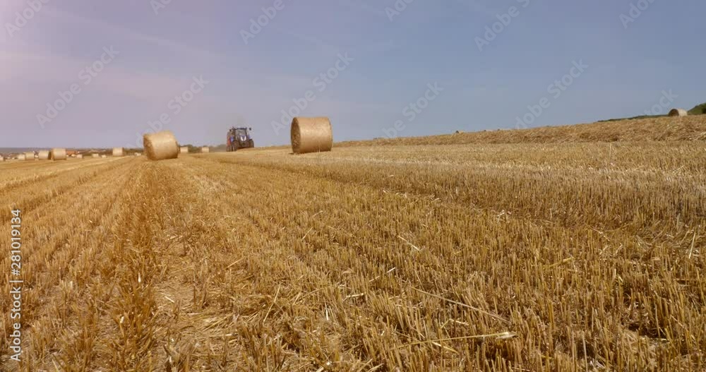 tractor and its trailer to make, the straw bales