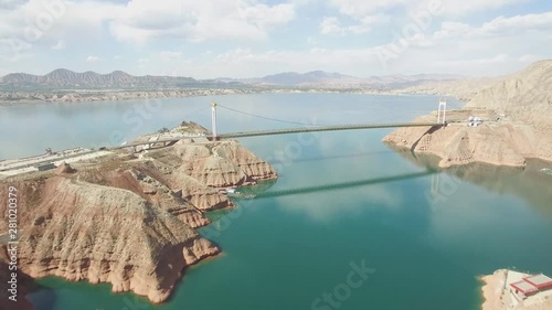 View of the bridge over the Yellow River near Trika in Amdo, Eastern Tibet. (aerial photography) photo