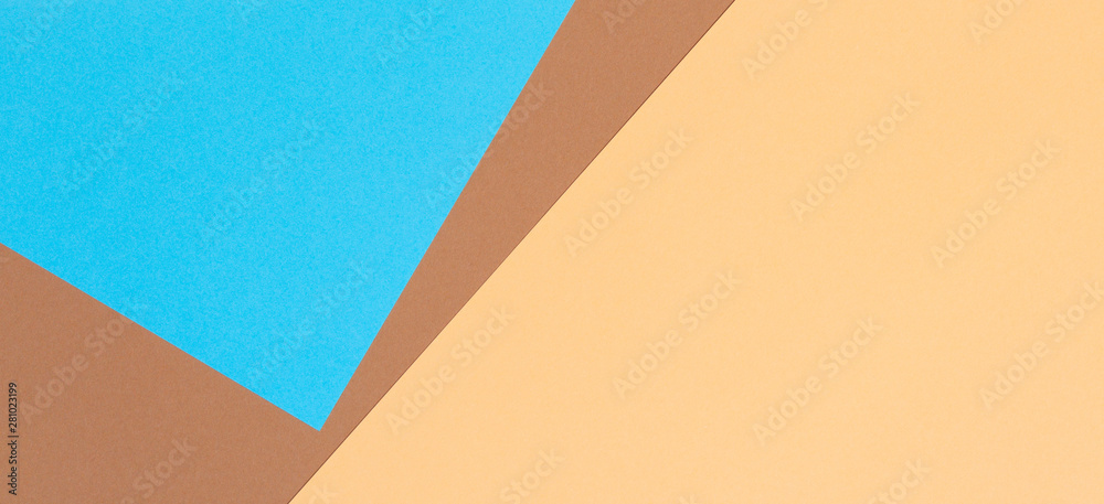 Color papers geometry composition background with beige, brown and light blue tones Color papers geometry composition background with beige, brown and light blue tones
