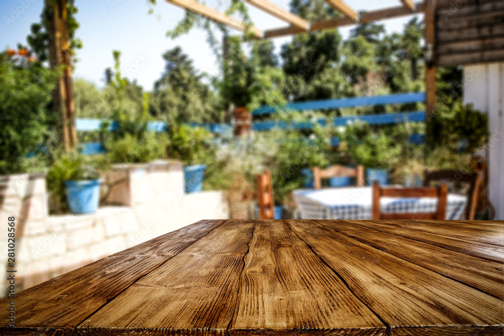 Table background and blurred garden view.