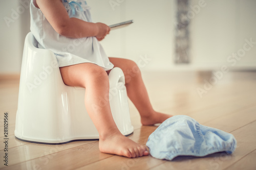  girl toddler sitting on potty