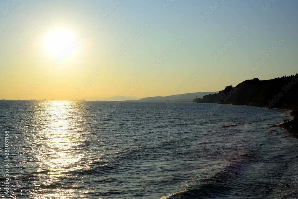 sunset over the rocky coast of the black sea