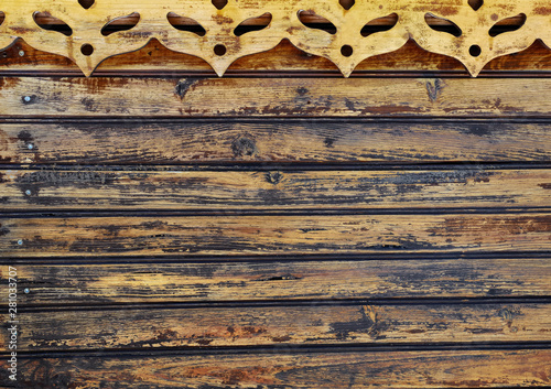 wooden background with old vanished boards and cut out carnival masks