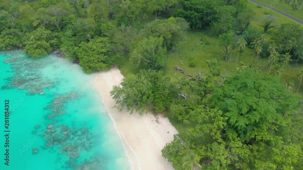 Port Orly sandy beach with palm trees, Espiritu Santo Island, Vanuatu. Port Orly sandy beach with palm trees, Espiritu Santo Island, Vanuatu.