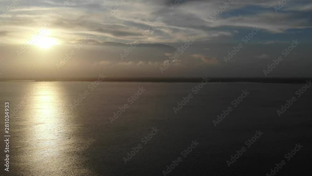 Drone shots of the sun setting on the sound on the crystal coast or outer banks of North Carolina. Drone shots of the sun setting on the sound on the crystal coast or outer banks of North Carolina.