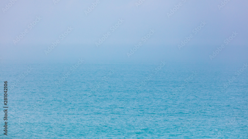 Expanse of water on the sea with a foggy horizon