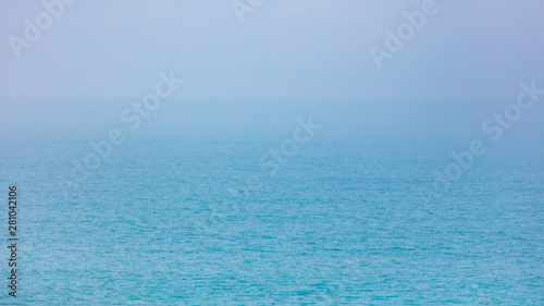 Expanse of water on the sea with a foggy horizon