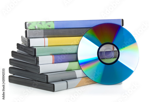 DVD, CD-ROM or Blu-Ray disc with stacked boxes for movies, audio or software on white photo