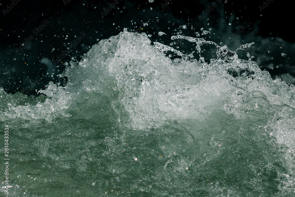 Splashes of water from the waves in the sea Splashes of water from the waves in the sea
