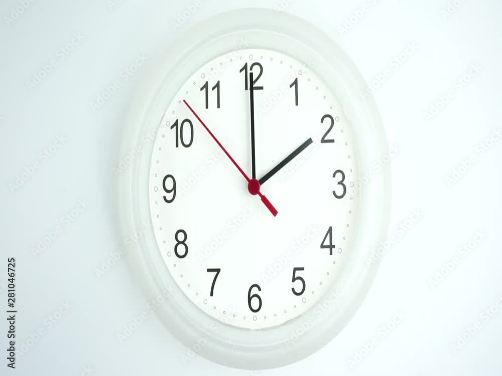 Closeup White wall clock face beginning of time 02.00 am or pm, Clock minute walk slowly, Time concept. Closeup White wall clock face beginning of time 02.00 am or pm, Clock minute walk slowly, Time concept.