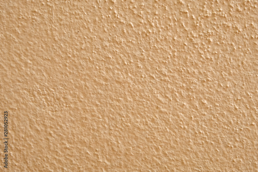 Brown cement wall background close up Brown cement wall background close up
