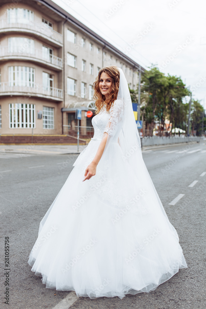 portrait of the bride in the city, young beautiful wedding bride portrait of the bride in the city, young beautiful wedding bride