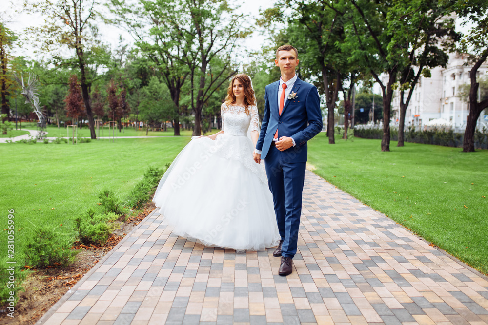beautiful young wedding couple in nature, couple in love