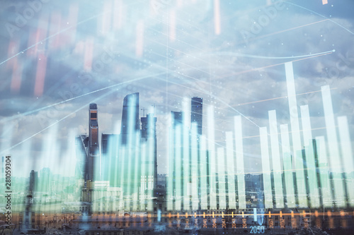 Double exposure of financial graph on downtown veiw background. Concept of stock market research and analysis