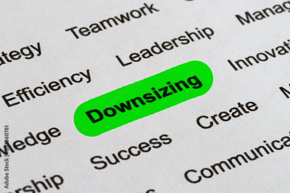 Downsizing - Business Buzzwords, printed on white paper and highlighted Downsizing - Business Buzzwords, printed on white paper and highlighted