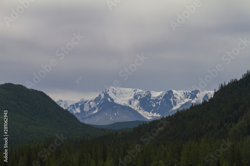 Snow top in Altai mountains. Close up. Summer travel concept.