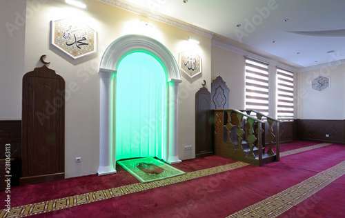 View of hall for praying (iwan) of a mosque with minbar (pulpit).  Islamic culture centre, Kiev, Ukraine