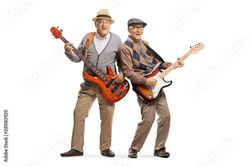 Two cheerful senior men playing electric guitars © Ljupco Smokovski