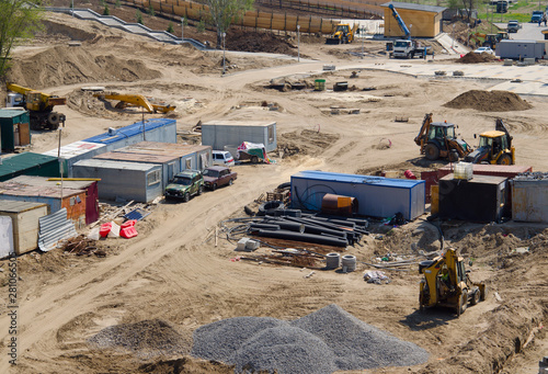 Construction site with building material and equipment