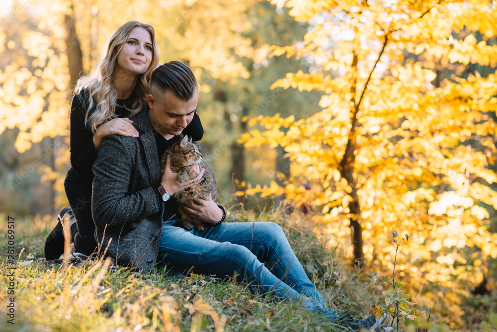 love, relationship, family and people concept - smiling couple having fun in autumn park love, relationship, family and people concept - smiling couple having fun in autumn park