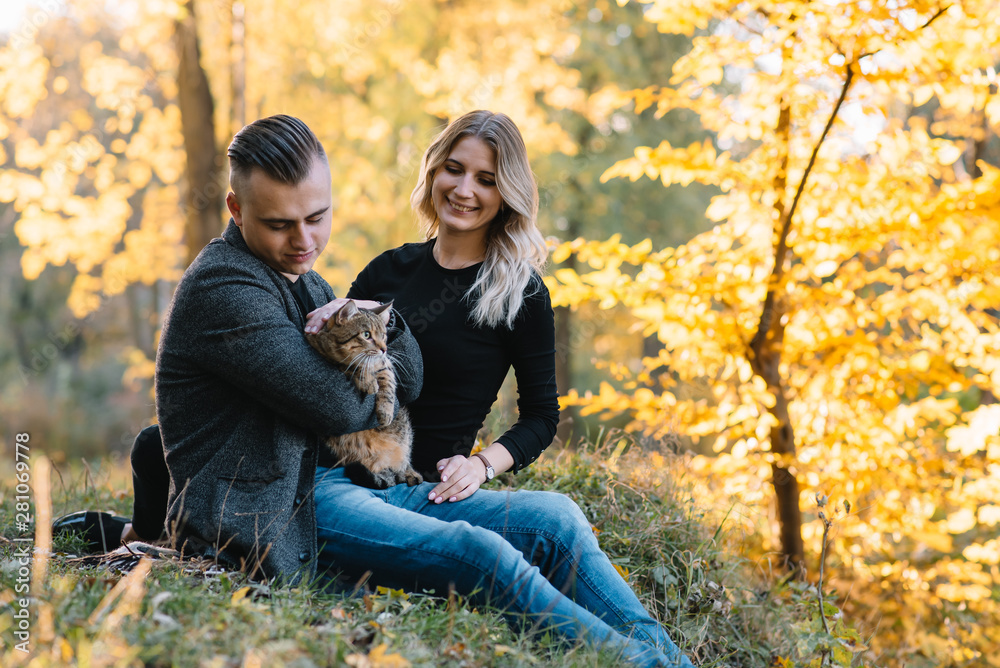 love, relationship, family and people concept - smiling couple having fun in autumn park love, relationship, family and people concept - smiling couple having fun in autumn park