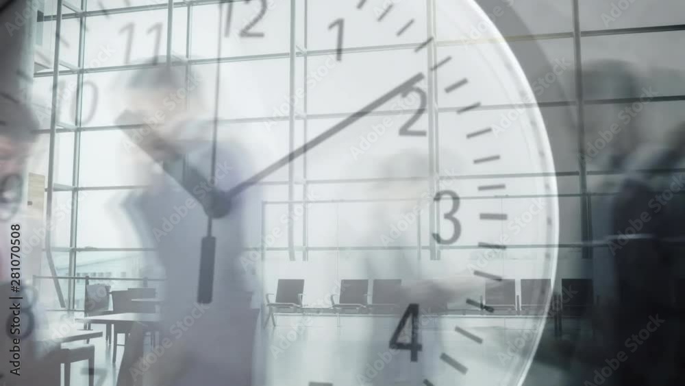 People walking fast with clock in the foreground