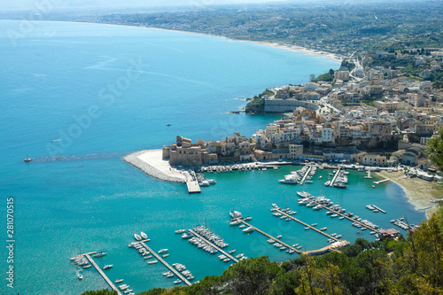 View on small Sicilian seaside town Castellammare del Golfo and golden beaches of Alcamo marina,  located in western part of island © barmalini