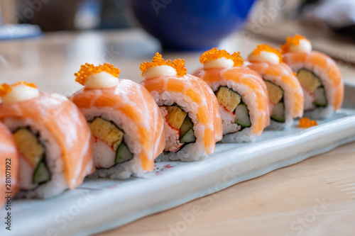 Salmon sushi roll, Japanese food. (selective focus point)