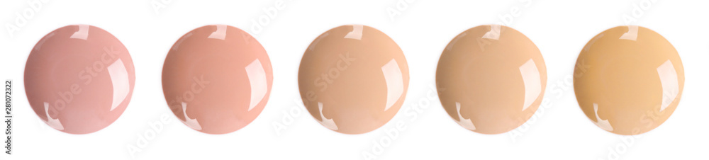 Set with smears of different foundations on white background. Banner design Set with smears of different foundations on white background. Banner design