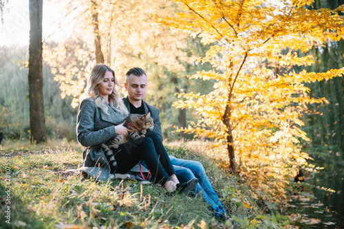 love, relationship, family and people concept - smiling couple having fun in autumn park © Serhii