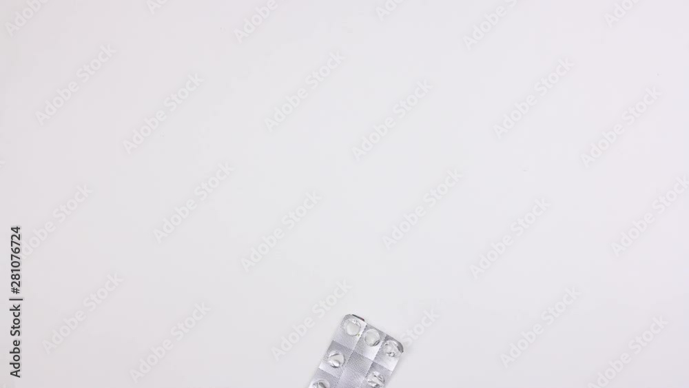 used plastic packet of medical pills moves on white background, seamless looping, stop motion animation, big ecological pollution garbage problem used plastic packet of medical pills moves on white background, seamless looping, stop motion animation, big ecological pollution garbage problem