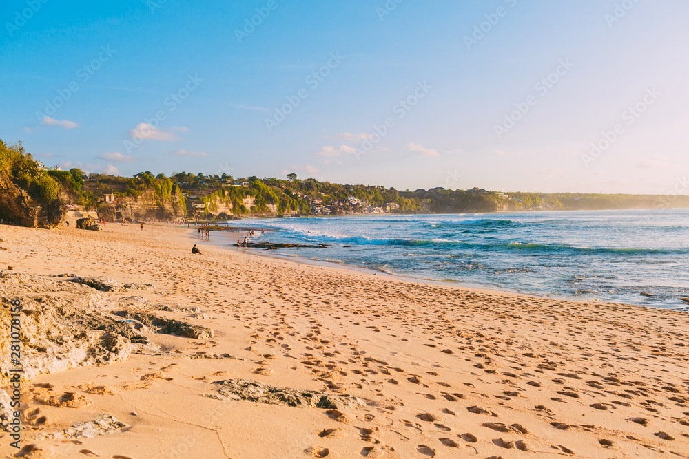 Sandy beach with blue ocean in tropical island