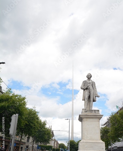 Sir John Gray statue and the Spire in O’Connell Street, Dublin, Ireland. He was honored for bringing water supply to Dublin and suburbs.
