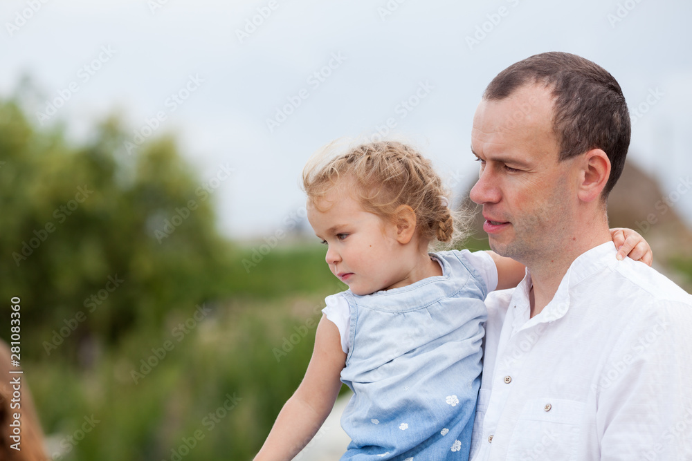 Portrait of little girl hugging her daddy Portrait of little girl hugging her daddy