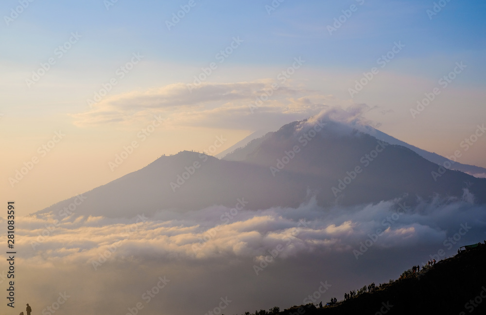 Dawn overlooking Batur volcano on Bali island in Indonesia.