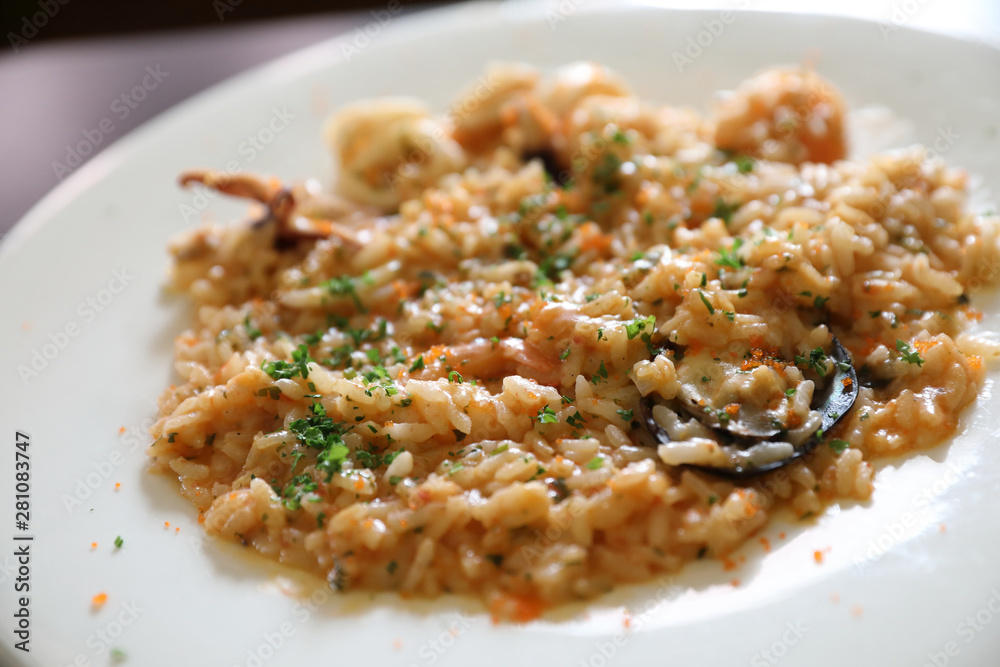 Seafood Risotto , traditional italian rice on table Seafood Risotto , traditional italian rice on table
