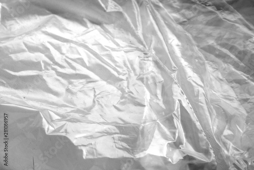 Plastic transparent old wrap texture in black and white.