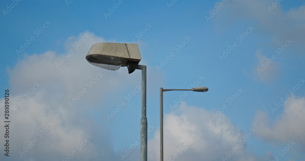 Street lamp pole with blue sky