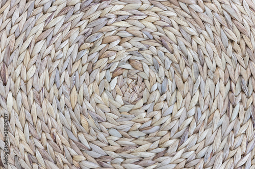 closeup detail of A circle knitted fabric weaving mat or pad with round pattern for table protection from heat ,background texture.
