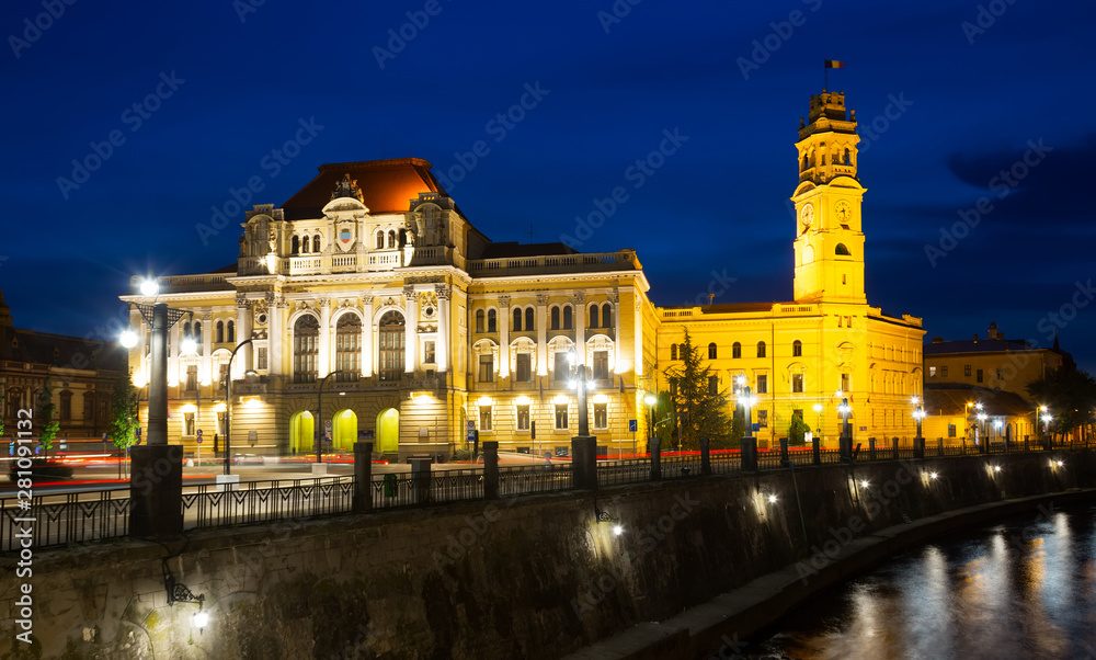 Oradea City Hall and river Crisul Repede in night
