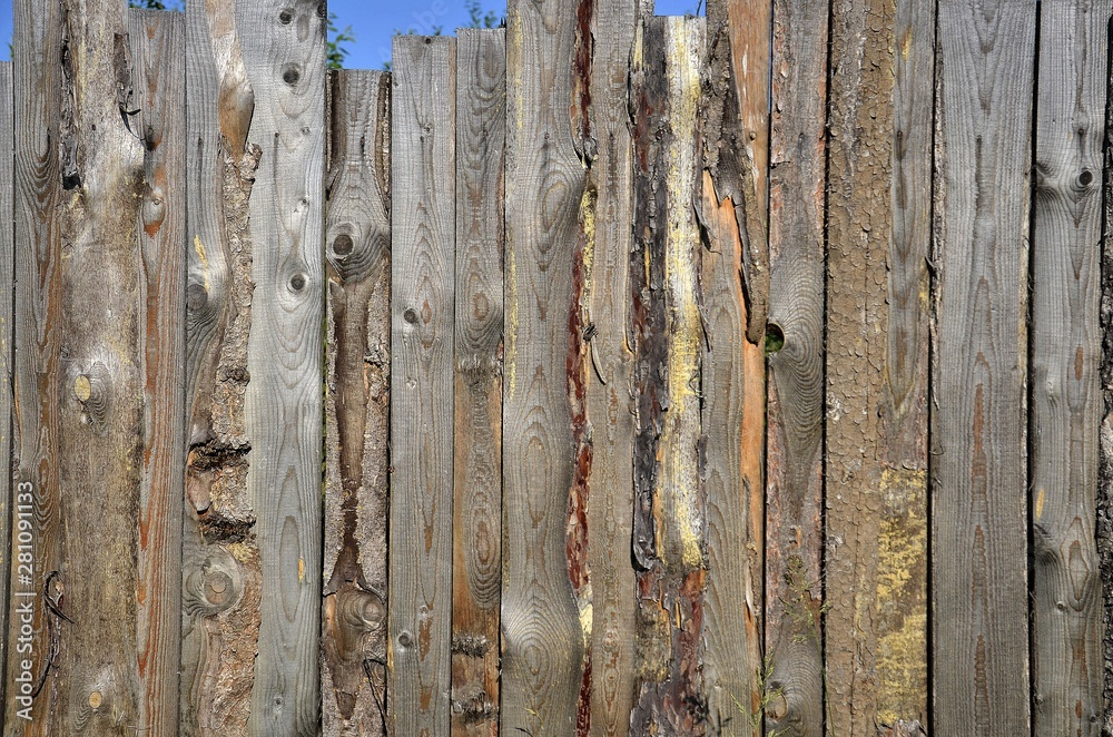 Textural background, old wooden fence from old boards. Textural background, old wooden fence from old boards.