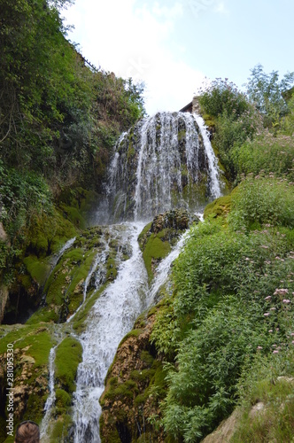 Waterfalls With Silk Effect Of A Crystalline Greenish Water In Orbaneja Del Castillo. August 28, 2013. Orbaneja Del Castillo, Burgos, Castilla Leon, Spain. Vacation Nature