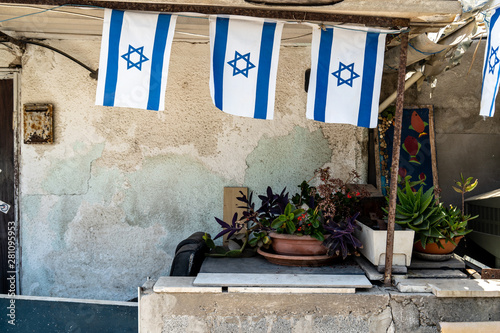 Israeli flags hanging outside of Jewish homes in Tel Aviv, Israel. photo