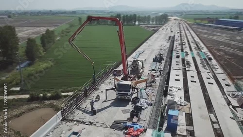 Aerial view of China's largest construction site. Construction of the automobile bridge in Guizhou province, infrastructure of China. photo