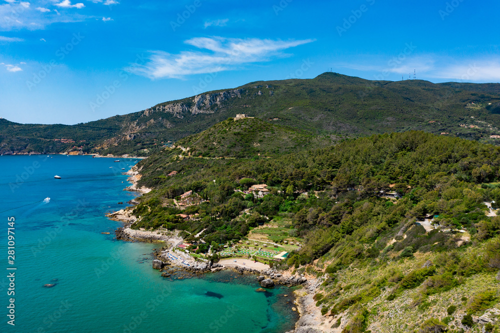 The coastline of Monte Argentario on a summers day. A stunning landscape and blue/turquoise ocean.