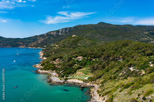 The coastline of Monte Argentario on a summers day. A stunning landscape and blue/turquoise ocean.