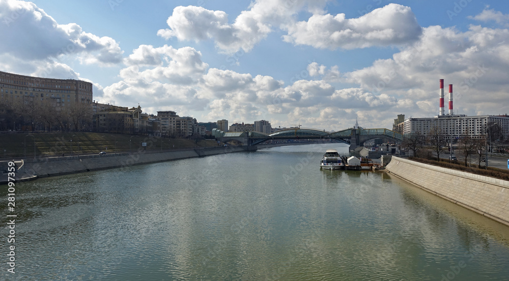 View from Berezhkovskaya Embankment on the Moscow River and the Bogdan Khmelnytsky Bridge on a sunny day