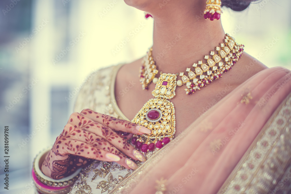 Indian bride's wearing her wedding jewellery close up
