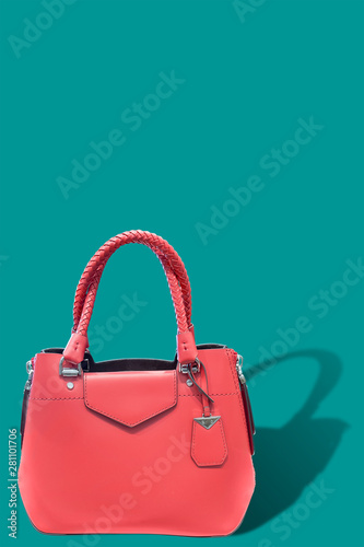 Red leather women's handbag.