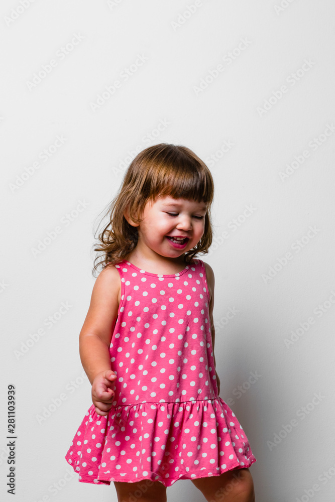 Dancing Baby Girl, Studio Portrait on White Background Dancing Baby Girl, Studio Portrait on White Background